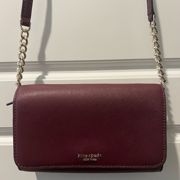Kate Spade Handbags - Burgundy Mini leather crossbody bag /clutch (removable strap) By Kate Spade